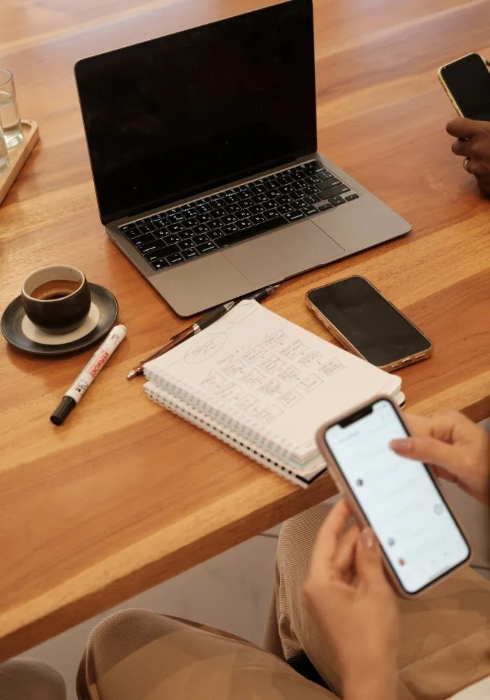Marketing team planning a digital campaign at a desk
